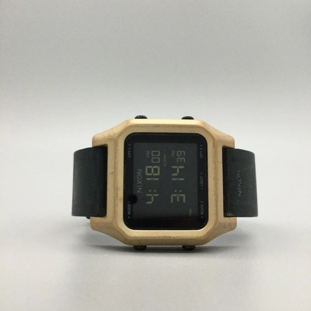 Nixon The Staple Mens Watch 39mm Gold Black Digital Alarm Backlight Silicone
